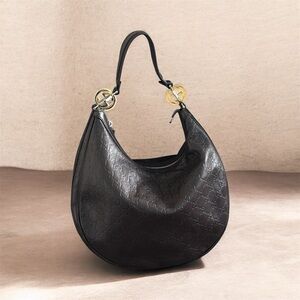 Gucci Elegant Black Hobo Bag. No tag. Never used